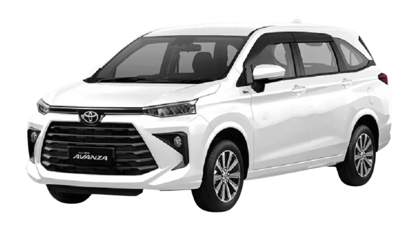 A comfortable private vehicle driving along a quiet, scenic highland road in Bali.