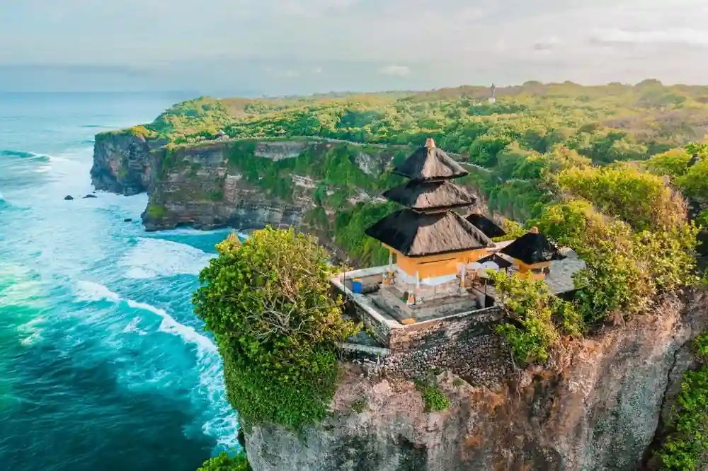 Watching the spectacular sunset at Uluwatu Temple, perched on a dramatic cliff.