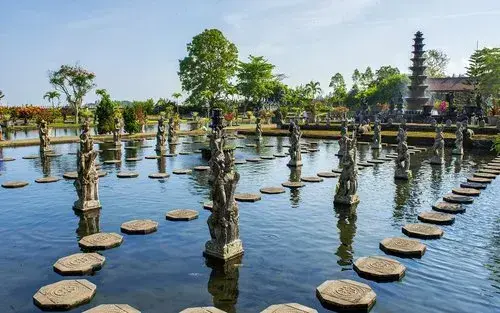 Beautiful stepping stones and koi ponds at Tirta Gangga water palace in East Bali.