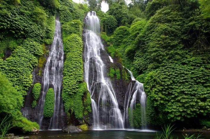 Crystal clear water at a hidden Bali waterfall.